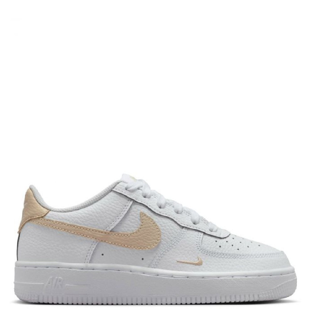 Big kid Nike Air Force 1 sneakers, side view with tan overlays on white upper