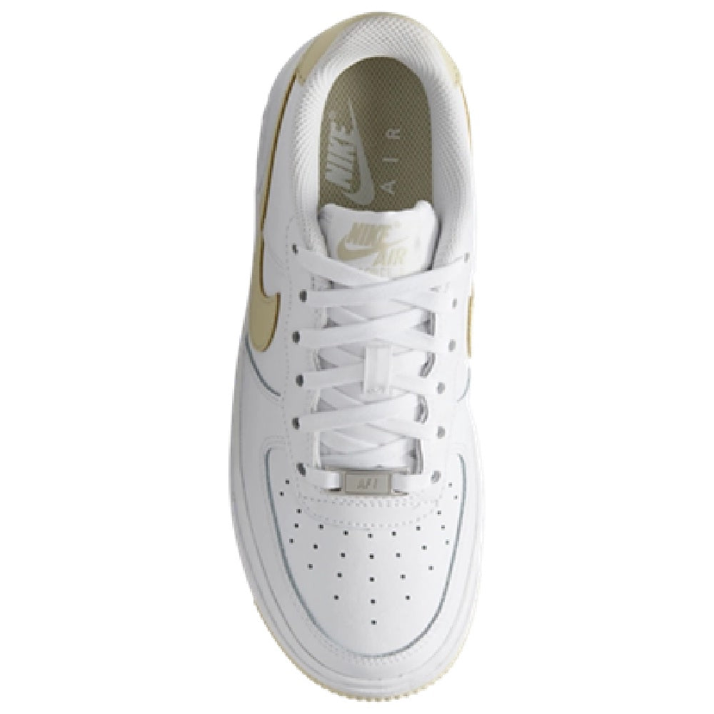 Big kid Nike Air Force 1 sneakers, lace-up front view with tan heel lining