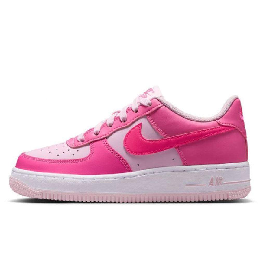 Kids' pink Air Force 1 sneakers with white toe panel, pink swoosh, and lace-up front