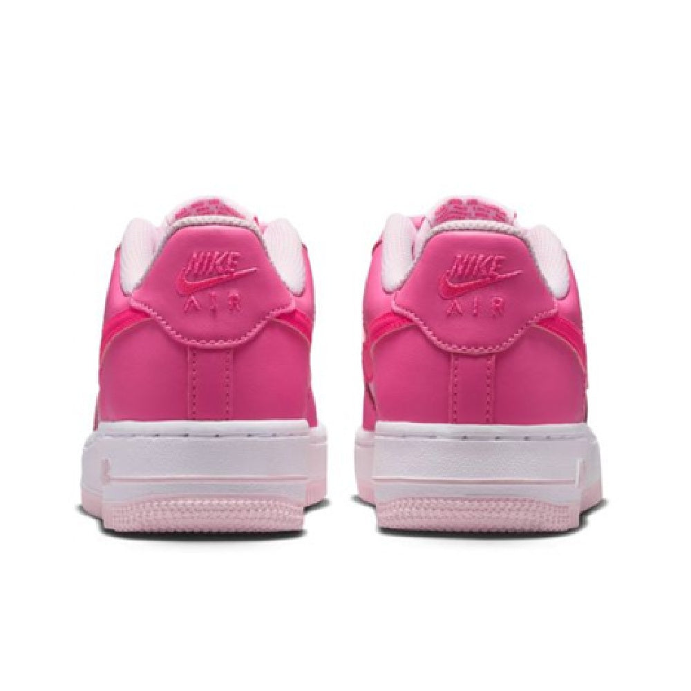 Kids' pink Air Force 1 sneakers, back view with Nike heel tab and white midsole