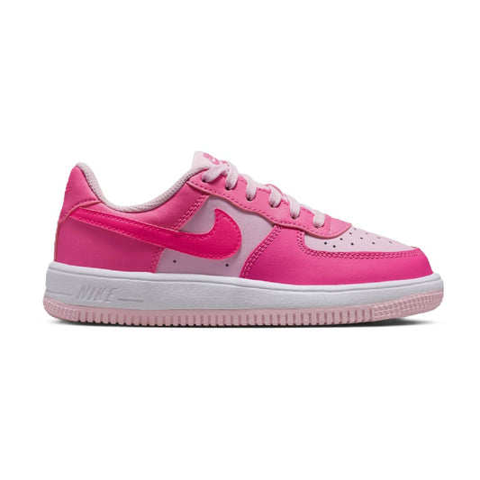 Kids low-top sneakers with pink and white panels, lace-up front and Swoosh