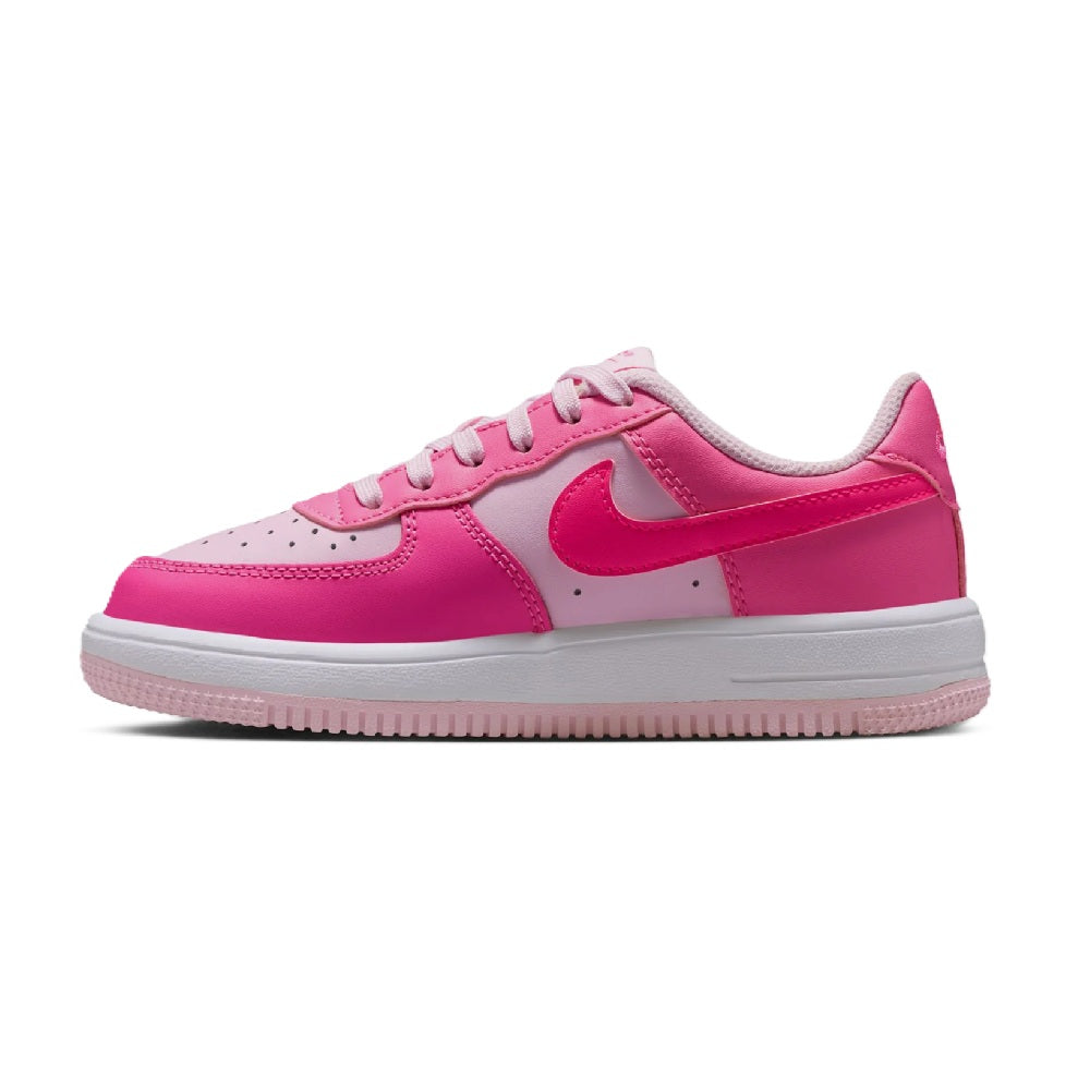 Kids low-top sneakers, pink upper with gray midsole, lace-up and curved Swoosh