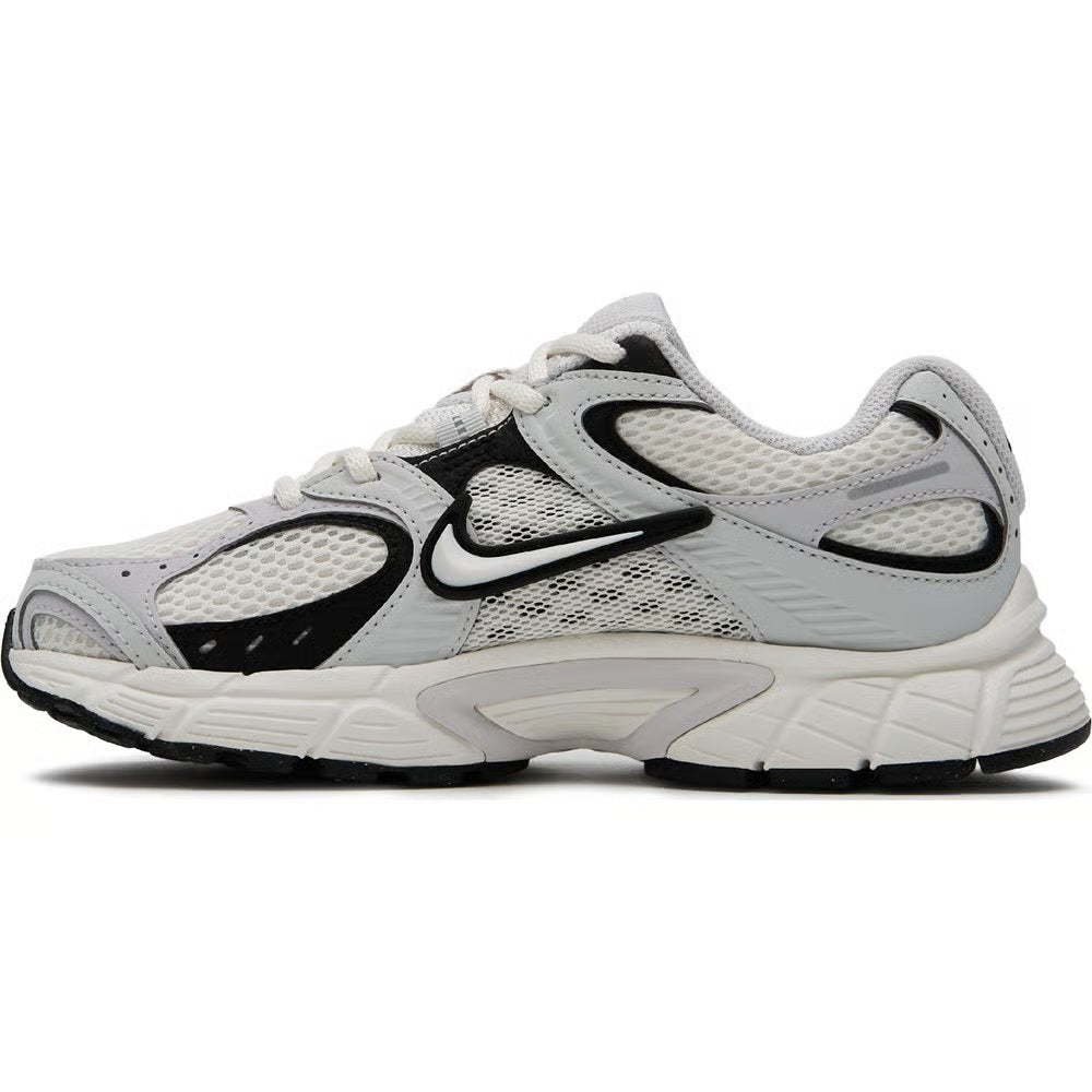 Men's Nike lace-up running sneaker, sail upper with black Swoosh and gray overlays