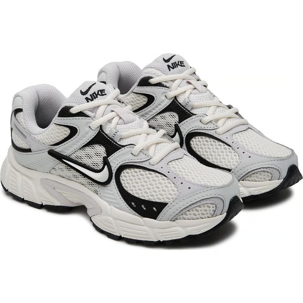 Pair of Men's Nike lace-up running sneakers, sail/gray uppers with black Swoosh