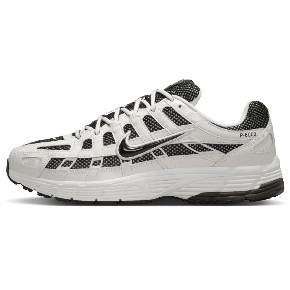 Nike P-6000 running sneaker in white with black and dark gray accents