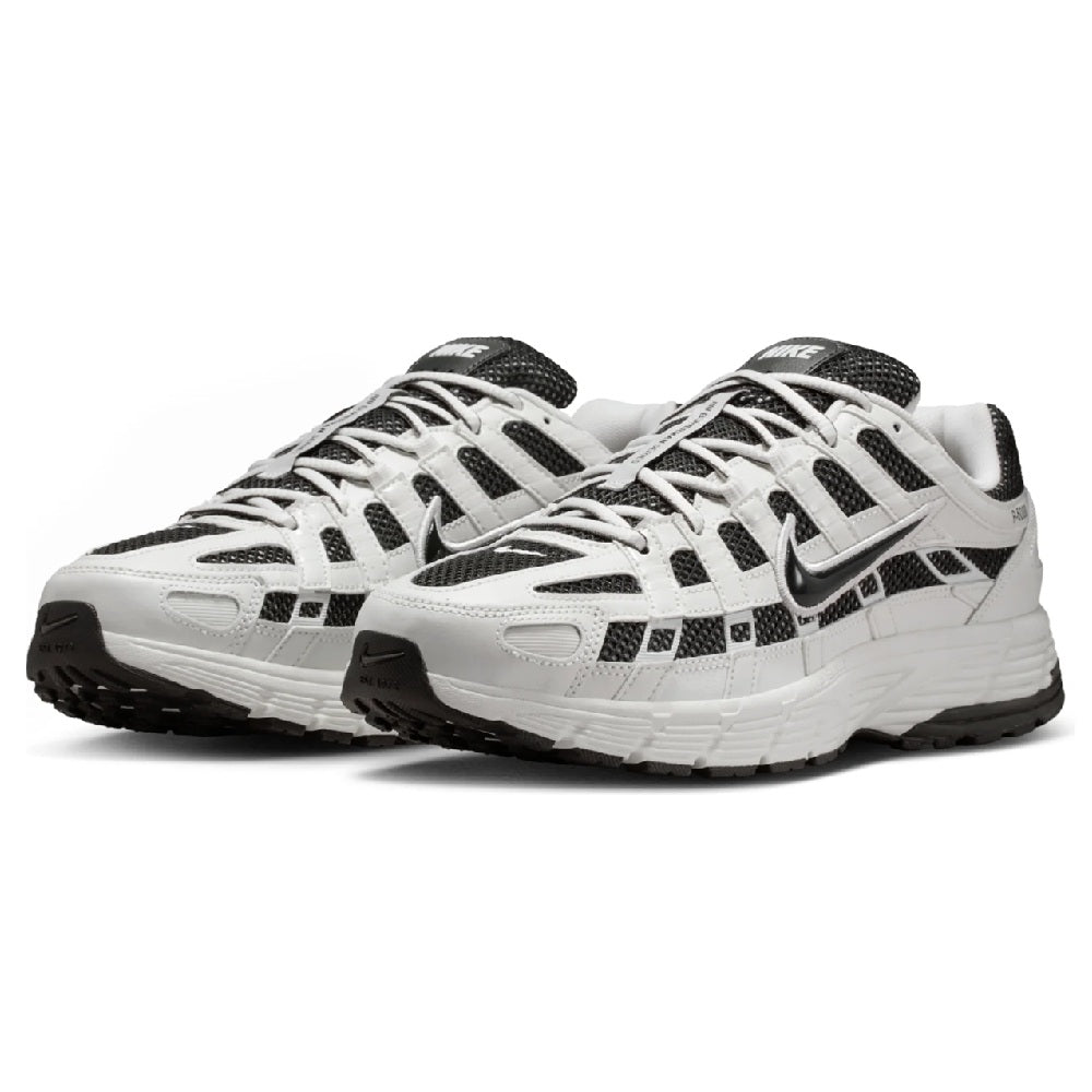 Nike P-6000 pair of sneakers with white mesh upper and black patterned panels