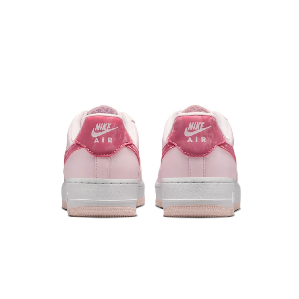 Women’s Nike Air Force 1 low-top sneaker heels, pale pink with “NIKE AIR” on back
