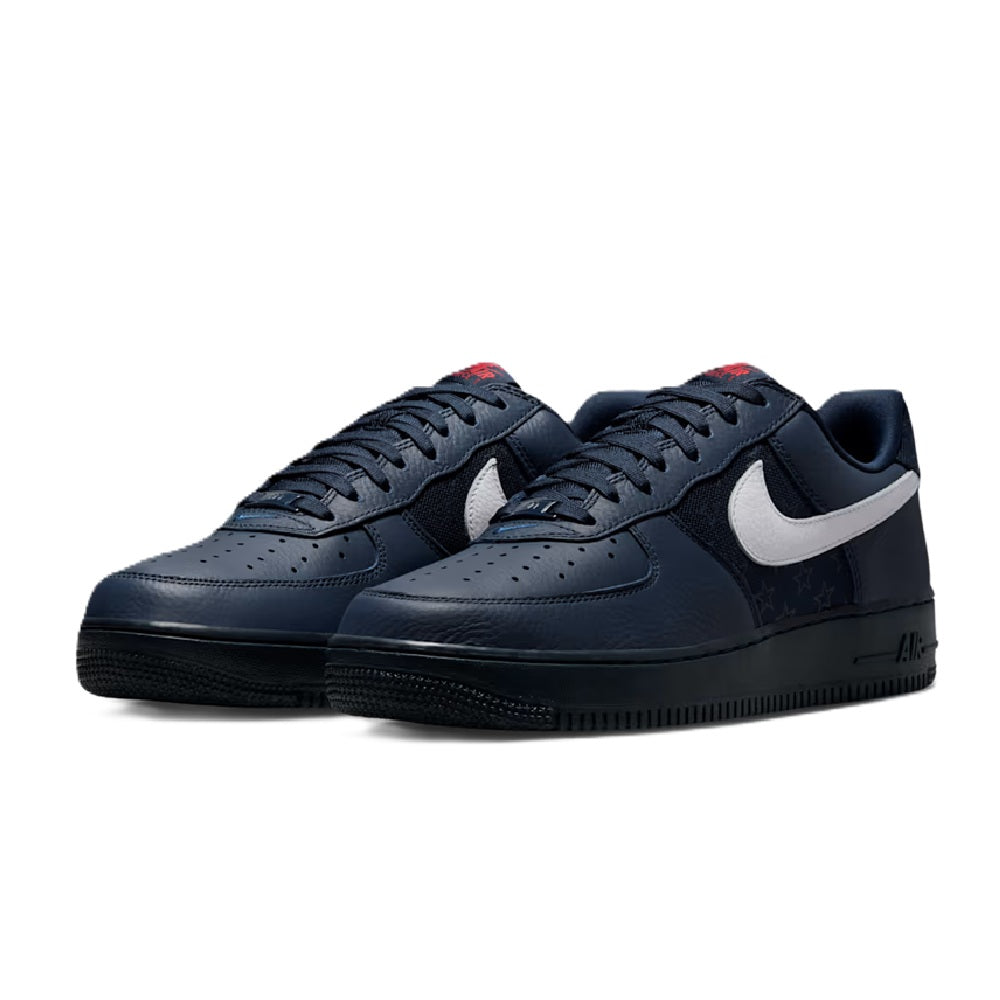 Navy Nike Air Force 1 low-top sneakers with white swoosh and black outsole