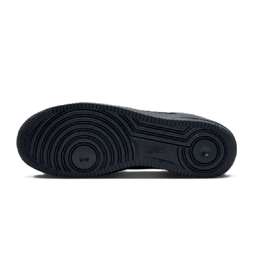 Black rubber outsole for Nike Air Force 1 low-top sneaker with traction tread
