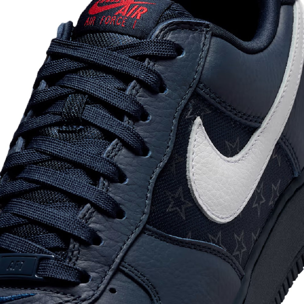 Navy leather Nike Air Force 1 upper with white swoosh and star-pattern details