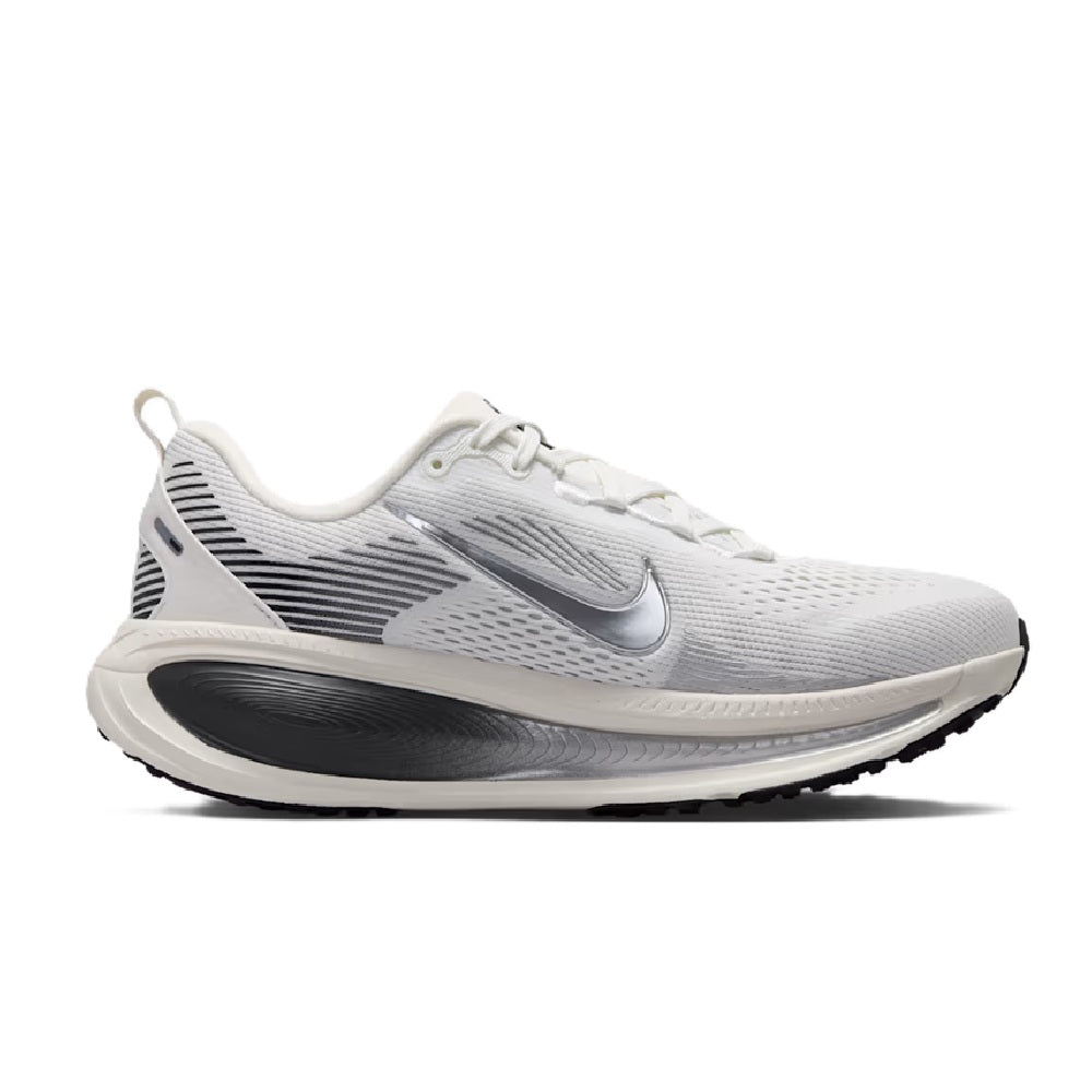 White Nike Vomero 18 lace-up running shoe with silver-gray stripe overlays and thick sole