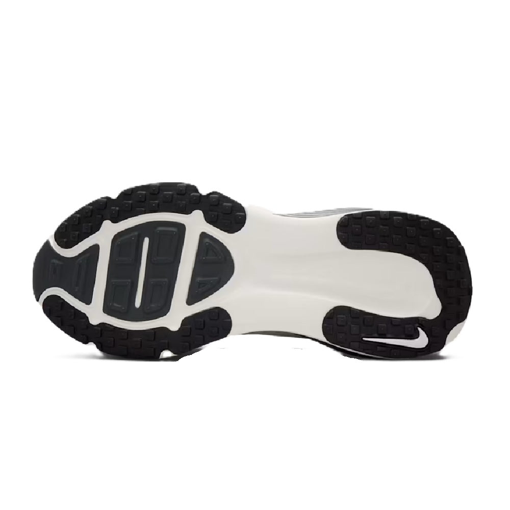Nike Vomero 18 outsole tread with dark rubber pods under white midsole