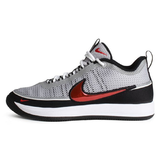 Silver knit low-top sneaker with red Nike swoosh and black sole