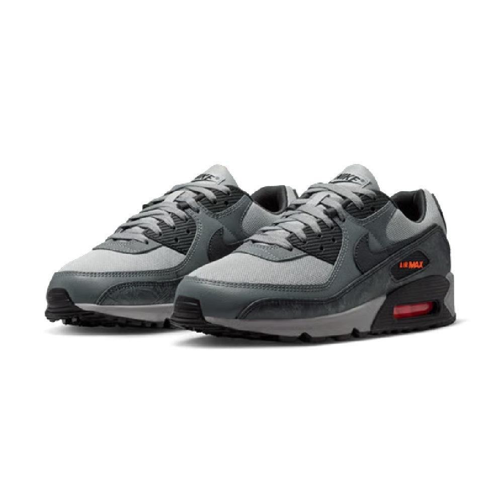 Pair of grey and black lace-up sneakers with Air Max logo and red air window