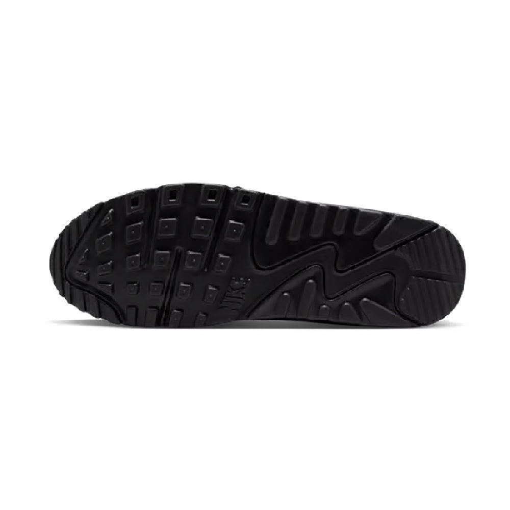 Black rubber sneaker outsole with deep traction tread pattern