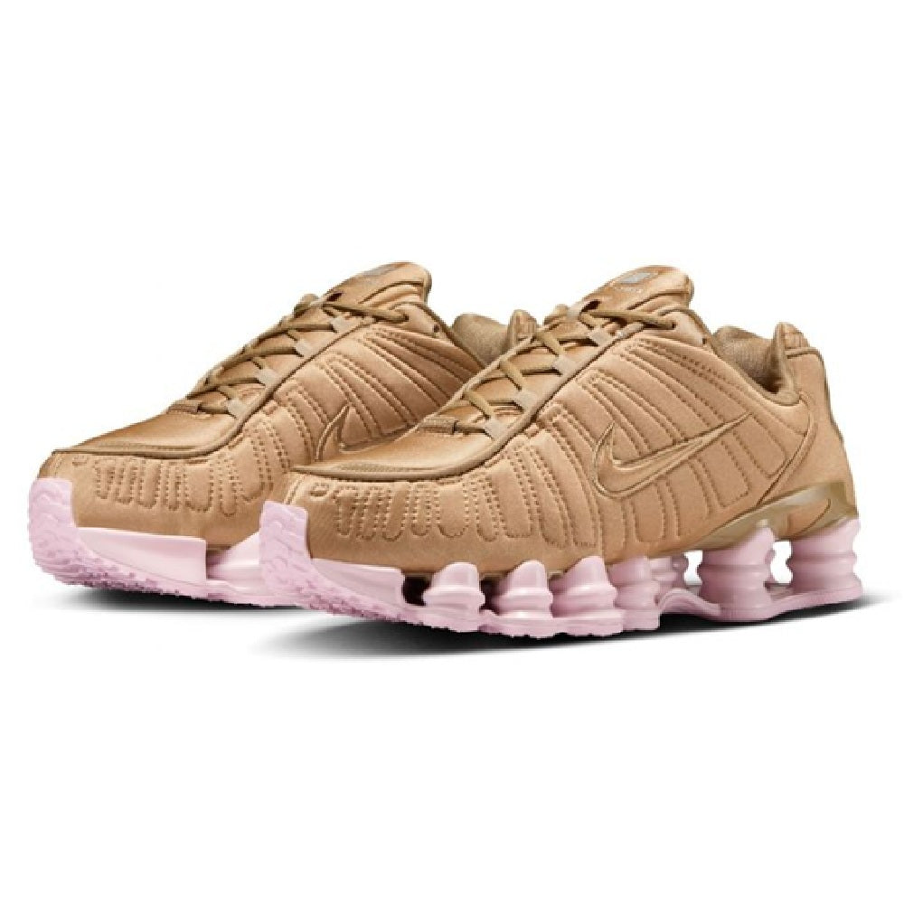 Nike Shox TL womens sneaker pair, tan laces and pink cushioned sole