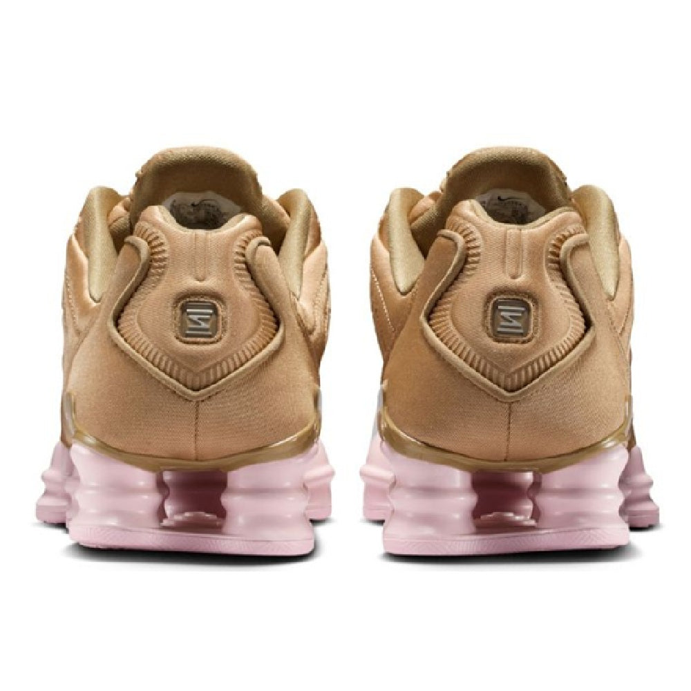 Nike Shox TL womens sneakers, heel view with tan foam collar and pink pods