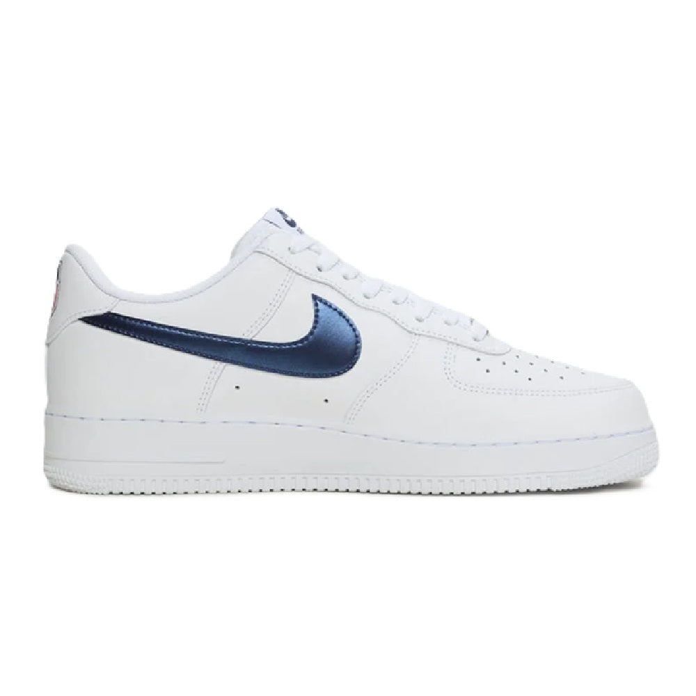 Nike Air Force 1 low-top sneakers, white leather with bold navy side swoosh and laces