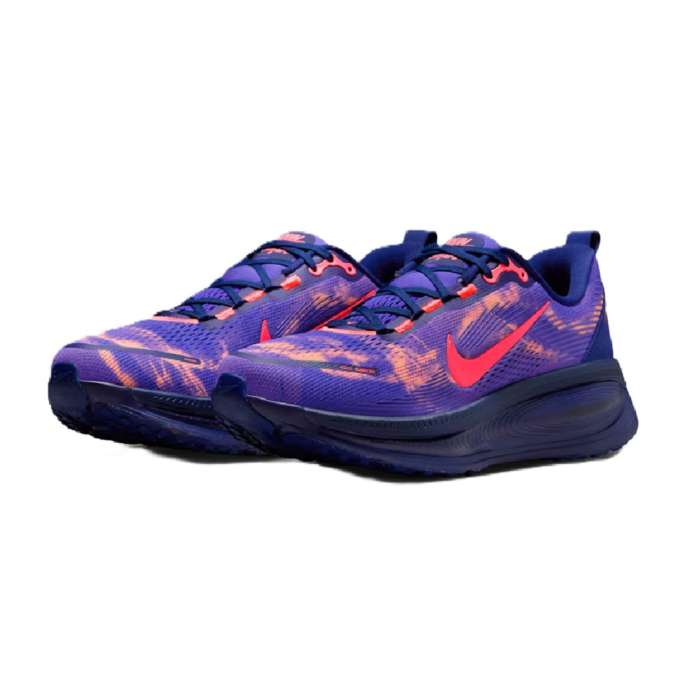 Pair of purple and navy lace-up running sneakers with red accents
