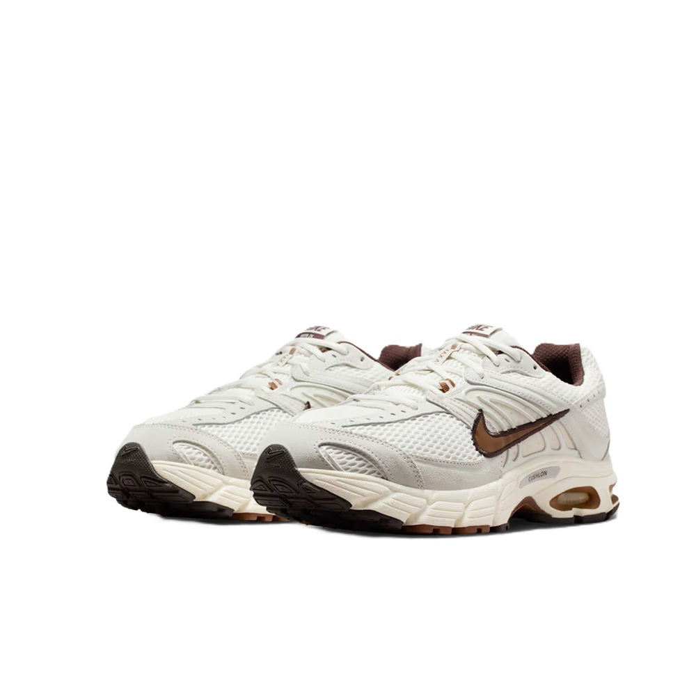 Men's Nike Air Max sneakers in white with brown accents, front three-quarter view