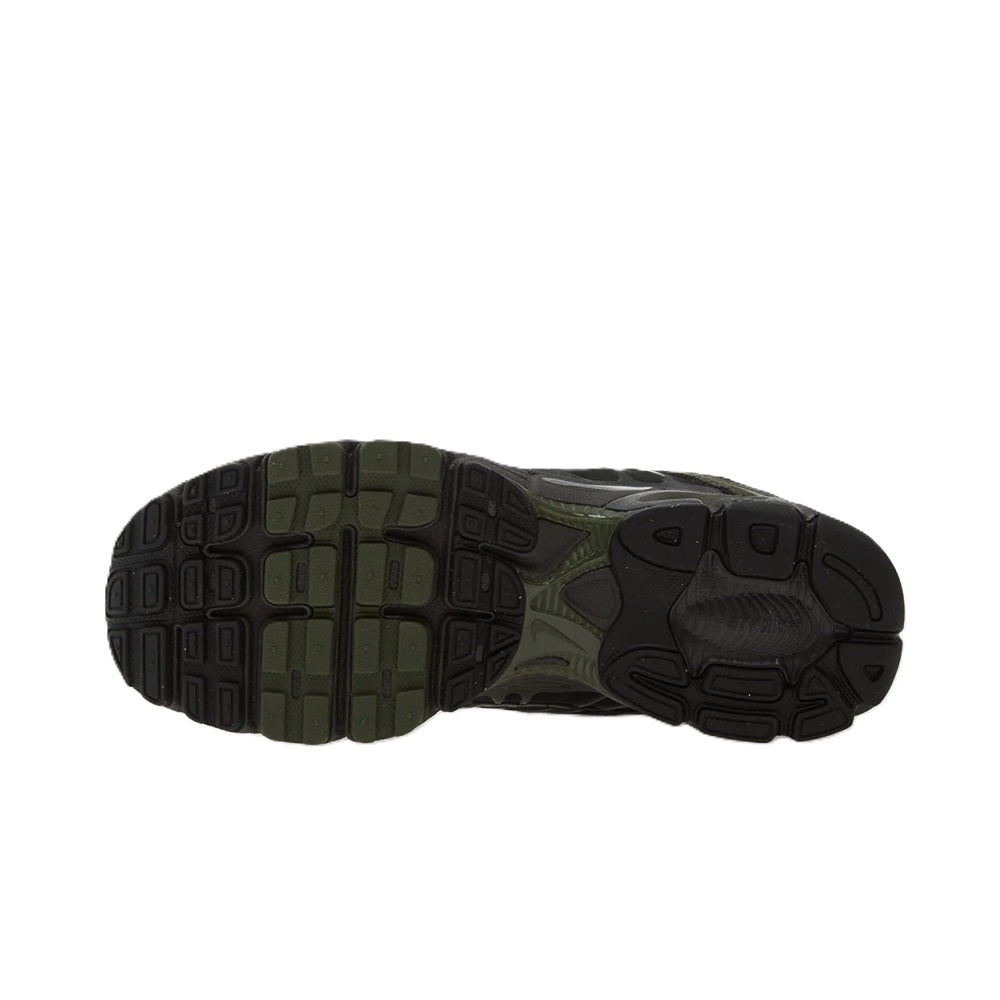 Men's Nike Air Max sneaker outsole view, rugged tread in dark olive and black