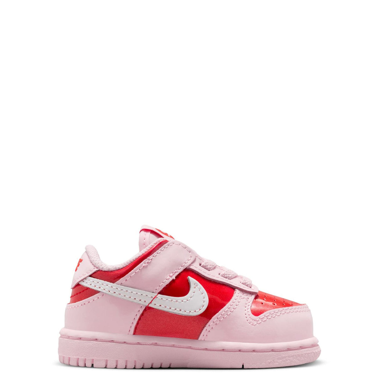 Toddler Nike Dunk Low low-top sneakers, pink leather with red inserts and white swoosh