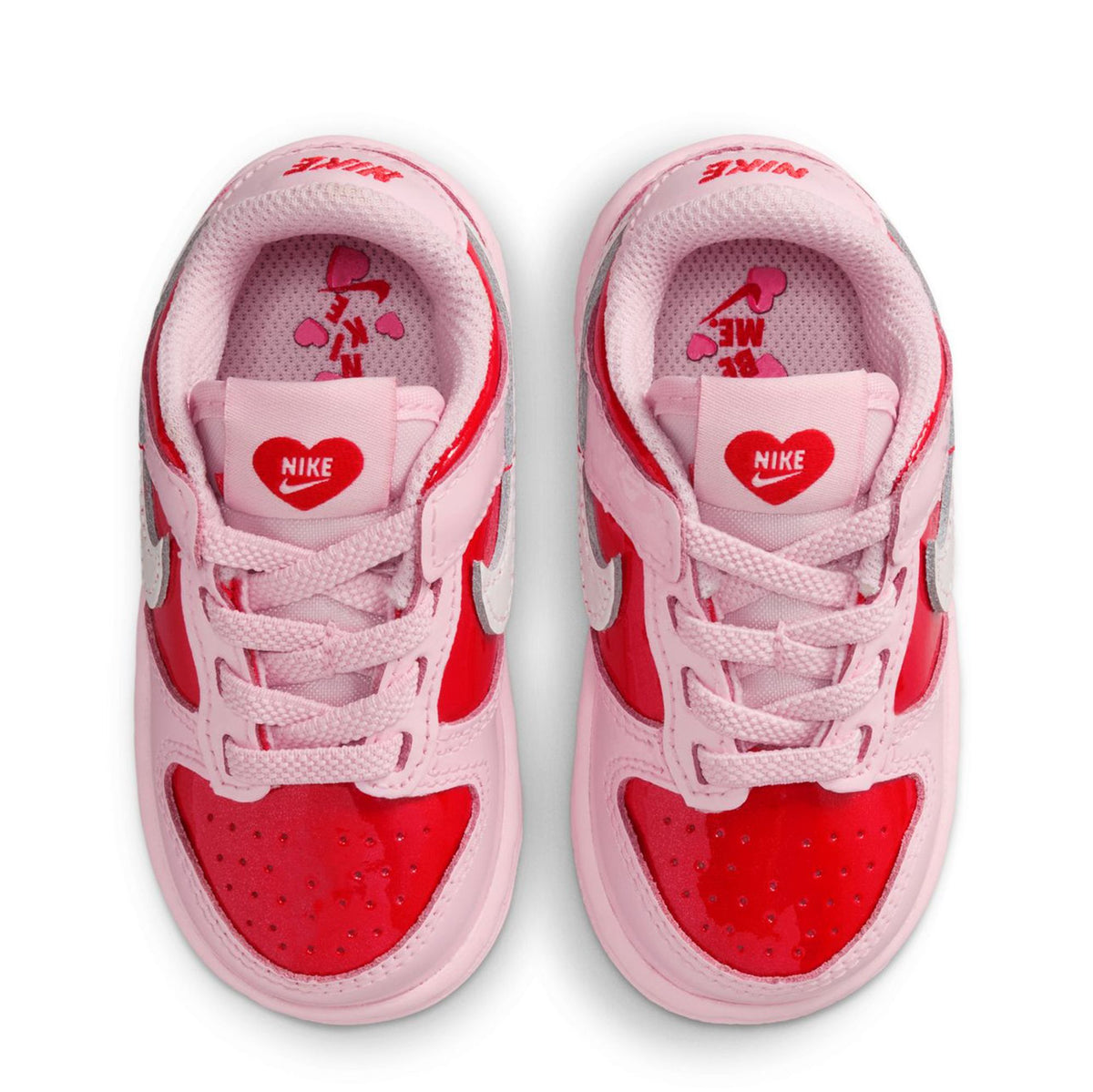 Toddler Nike Dunk Low sneakers, top view showing laces and Nike logo on tongue