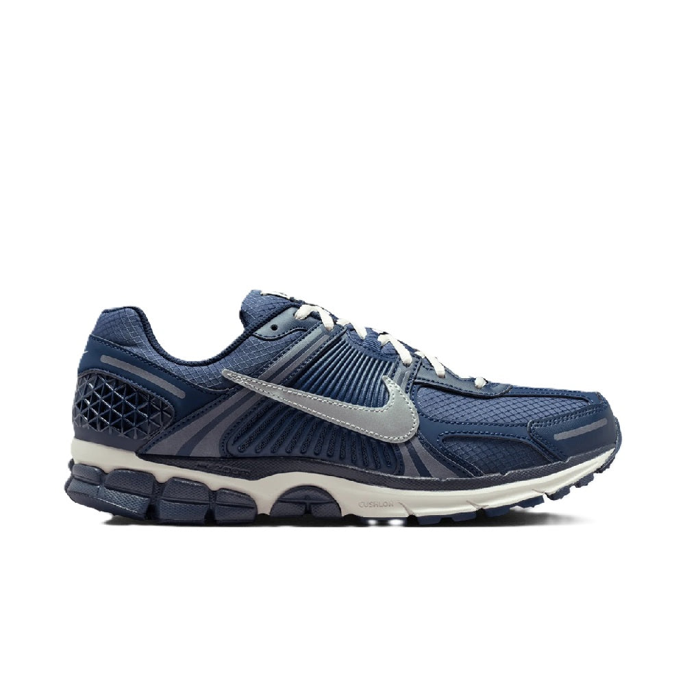 Men's Nike Zoom running shoe in blue with metallic silver swoosh and white midsole