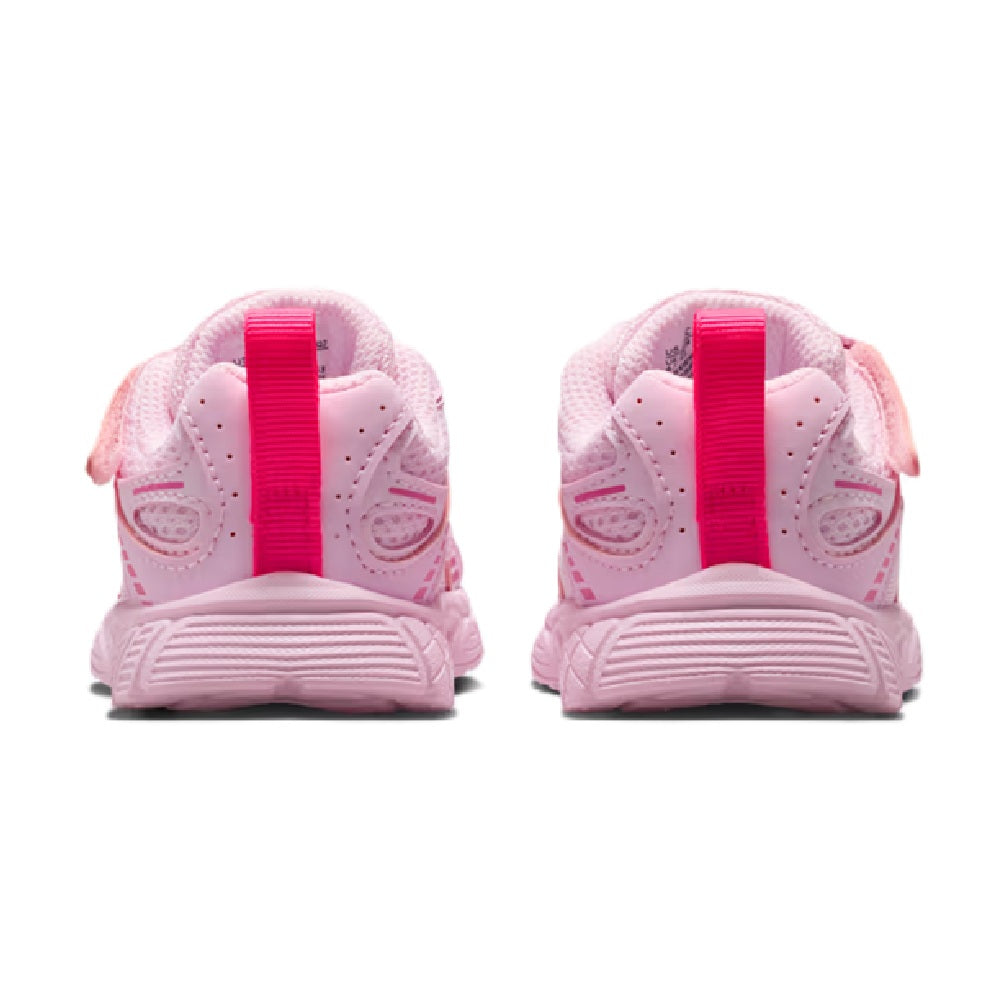Toddler Nike pink sneakers, rear view with bold heel strap and treaded sole
