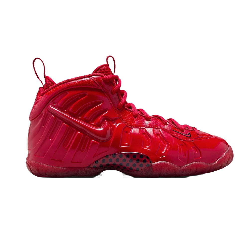 Red high-top Nike sneakers with laces and glossy molded details