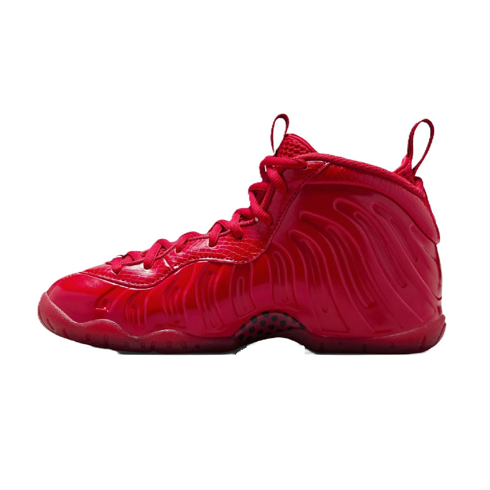 Red Nike high-top sneakers, side profile with lace-up closure and textured sole