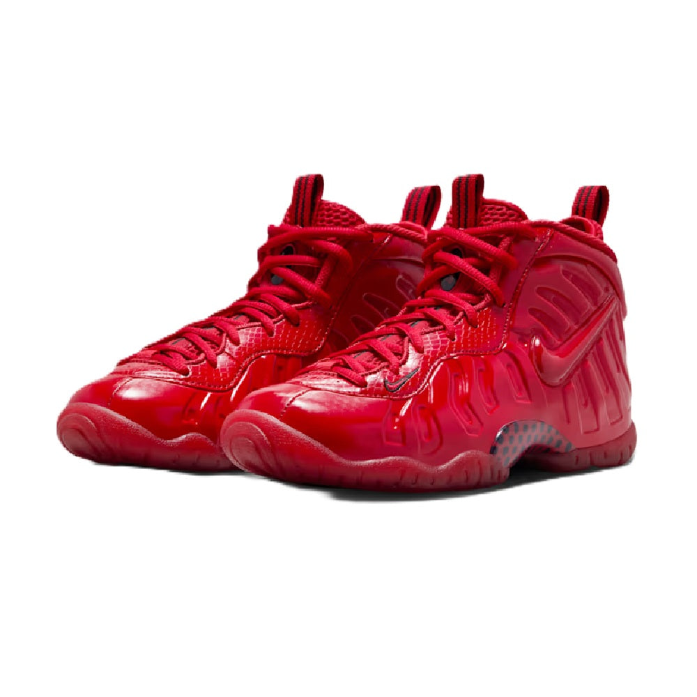 Red Nike high-top sneakers, front view with lace-up and ribbed upper design