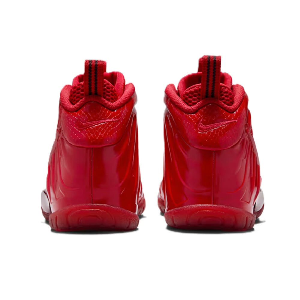 Red Nike high-top sneakers, back view with heel tabs and textured collar