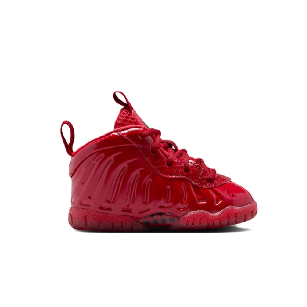 Toddler Nike Little Posite Pro sneaker in gym red with red laces and sculpted sole.