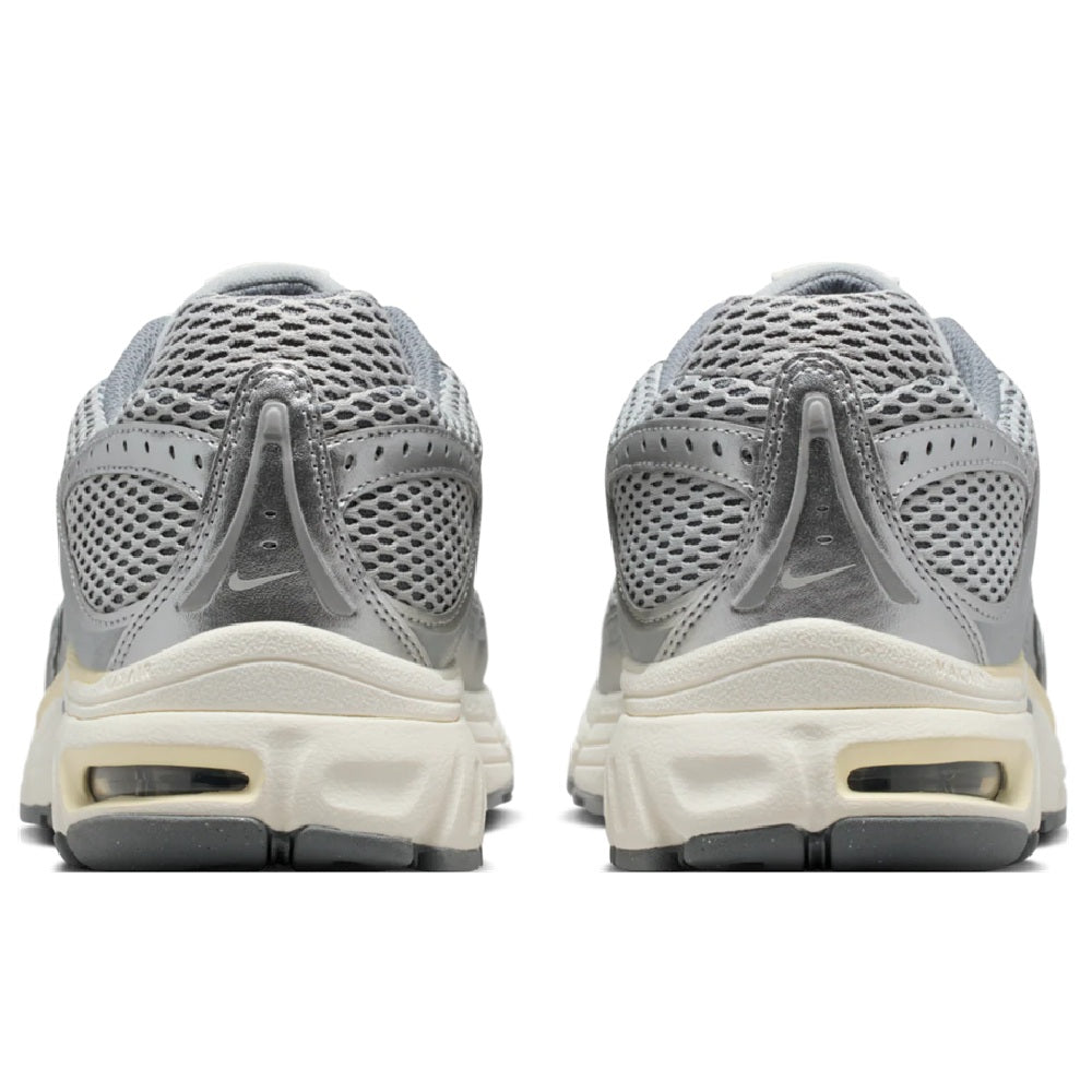 Nike Air Max Moto 2K sneakers heel view, grey mesh, Air window, cream midsole, lace-up