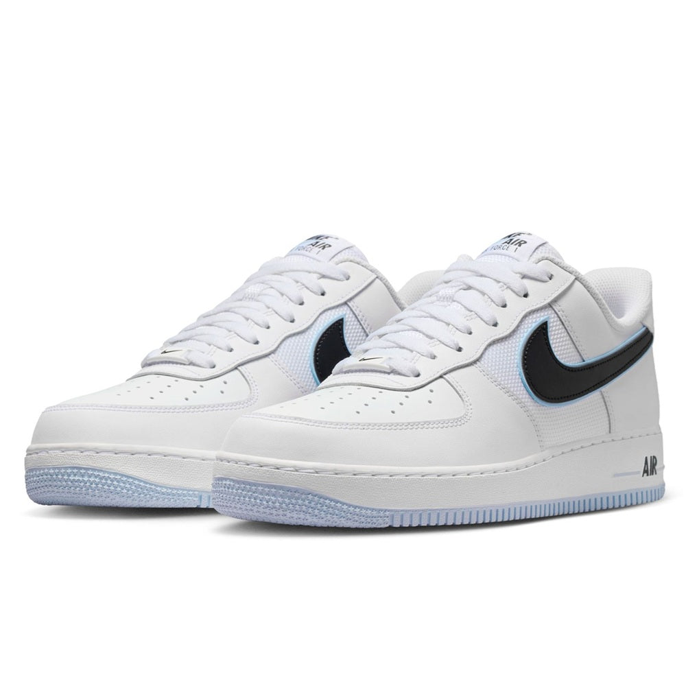 Pair of Nike Air Force 1 low-top sneakers, white with black swoosh and light blue trim
