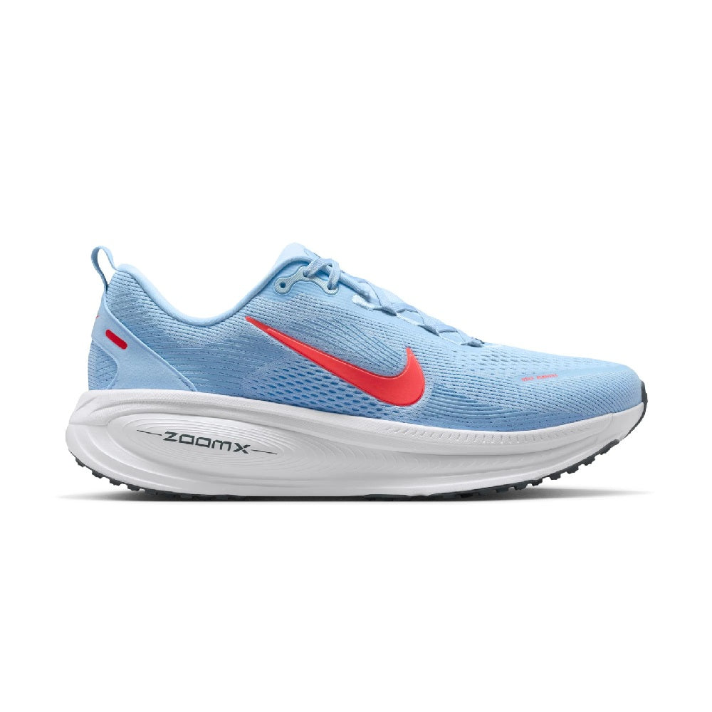 Men's Nike running shoes in light blue mesh, red swoosh, white foam midsole.