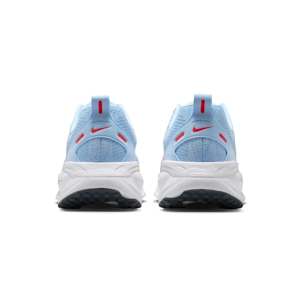Men's Nike running shoes heel view, light blue upper with red accents and white midsole.