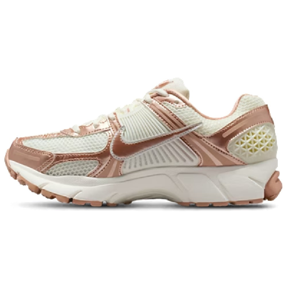 Women’s Nike Zoom Vomero 5 running shoe, rose-gold overlays, front three-quarter view