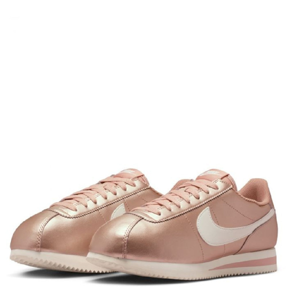 Nike Cortez MTLC sneakers, front angled view in rose-gold with sail swoosh overlay