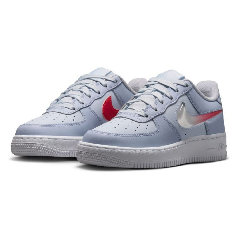 Kids' Nike Air Force 1 sneakers pair, light grey-blue uppers with red and pale blue swooshes