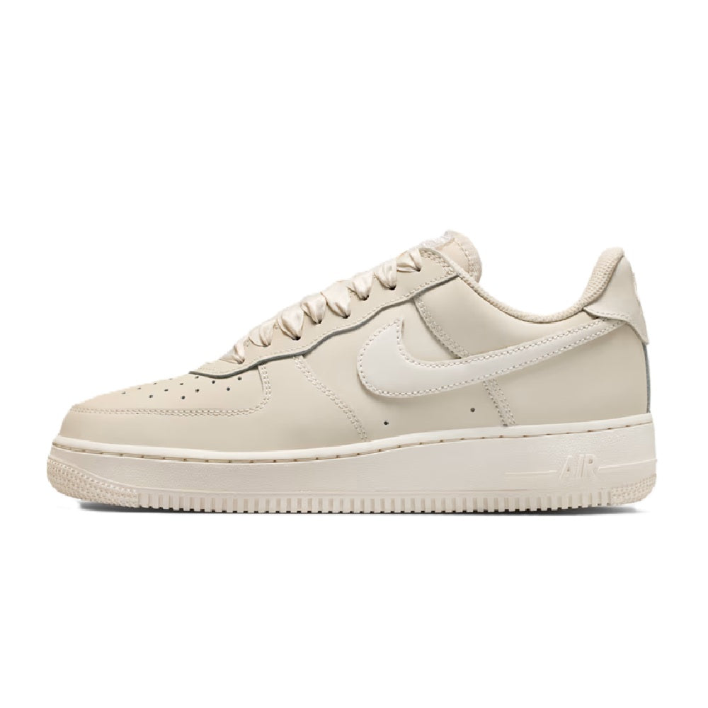Nike Air Force 1 low-top sneakers, pale ivory leather with oatmeal collar and side swoosh