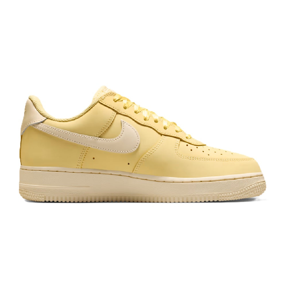 Women's Nike Air Force 1 PRM sneakers, soft yellow leather with white swoosh