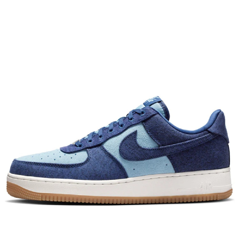 Nike Air Force 1 low-top sneaker with navy suede panels, light blue overlays, gum sole