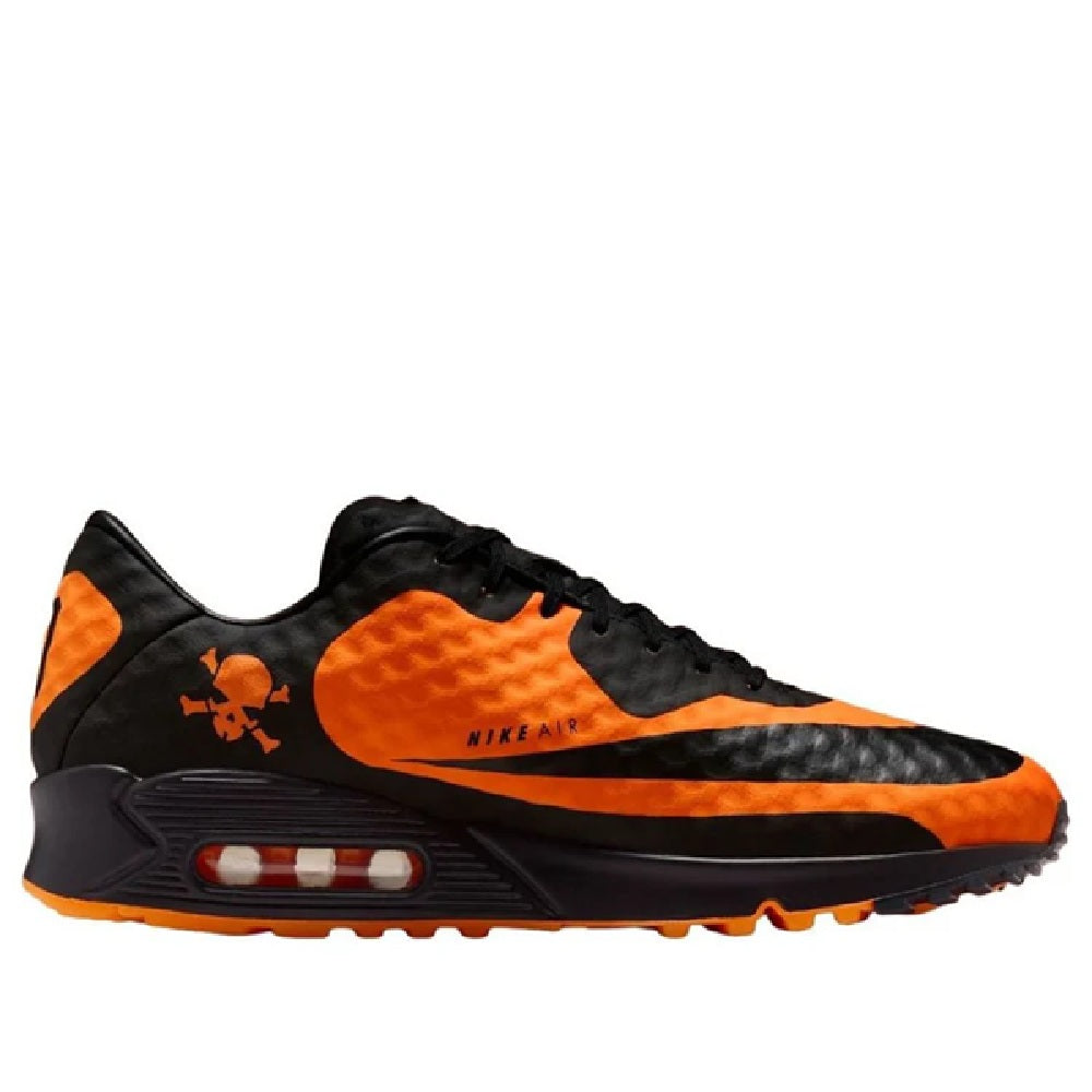 Nike Air Max 90 sneakers, side view in black with bright orange accents and Air window
