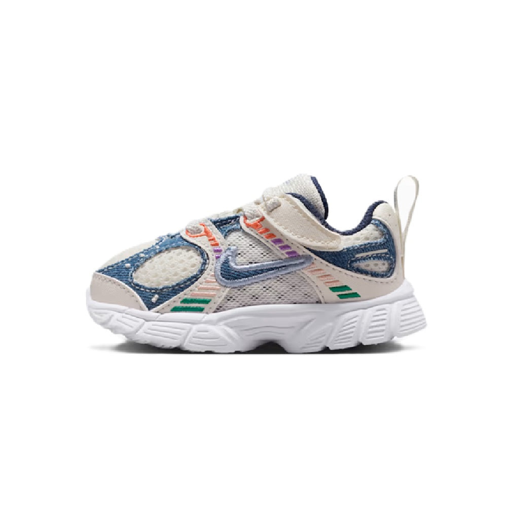Toddler Nike RNR sneaker with blue side panels, cream upper, and rainbow logo accents