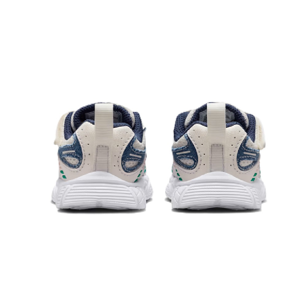 Toddler Nike RNR sneaker with navy heel tab, cream back, and cushioned white sole