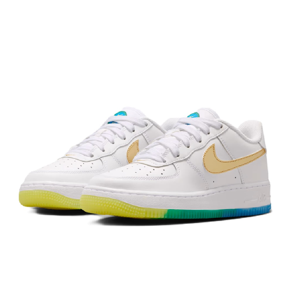Pair of white low-top sneakers with gold swooshes and multicolor rubber outsole