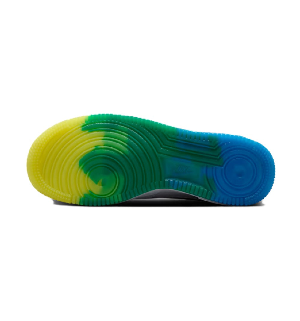 Multicolor rubber outsole with green, yellow, and blue tread