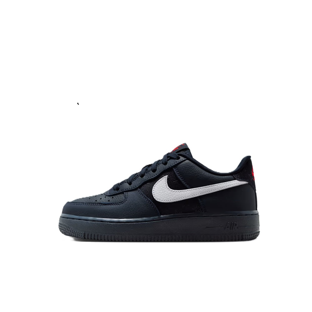 Nike Air Force 1 low sneakers, dark navy/black with white swoosh and lace-up.